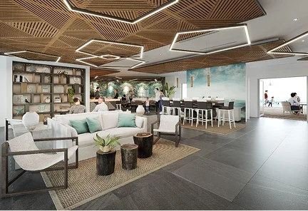 Interior del lobby moderno de Rum Point Club Residences con techos de madera de diseño geométrico, mobiliario contemporáneo en tonos neutros y una amplia vista hacia la terraza exterior.